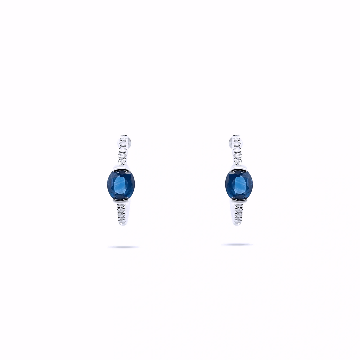 BLUE SAPPHIRE OVAL AND DIAMOND HUGGIE EARRINGS