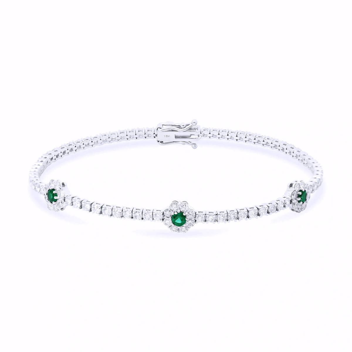 DIAMOND AND EMERALD FLOWER TENNIS BRACELET
