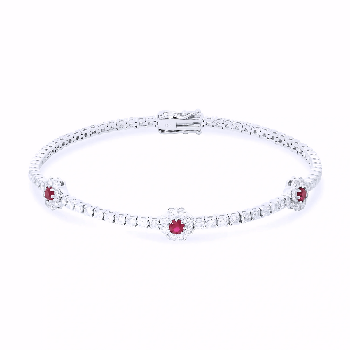 DIAMOND AND RUBY FLOWER TENNIS BRACELET