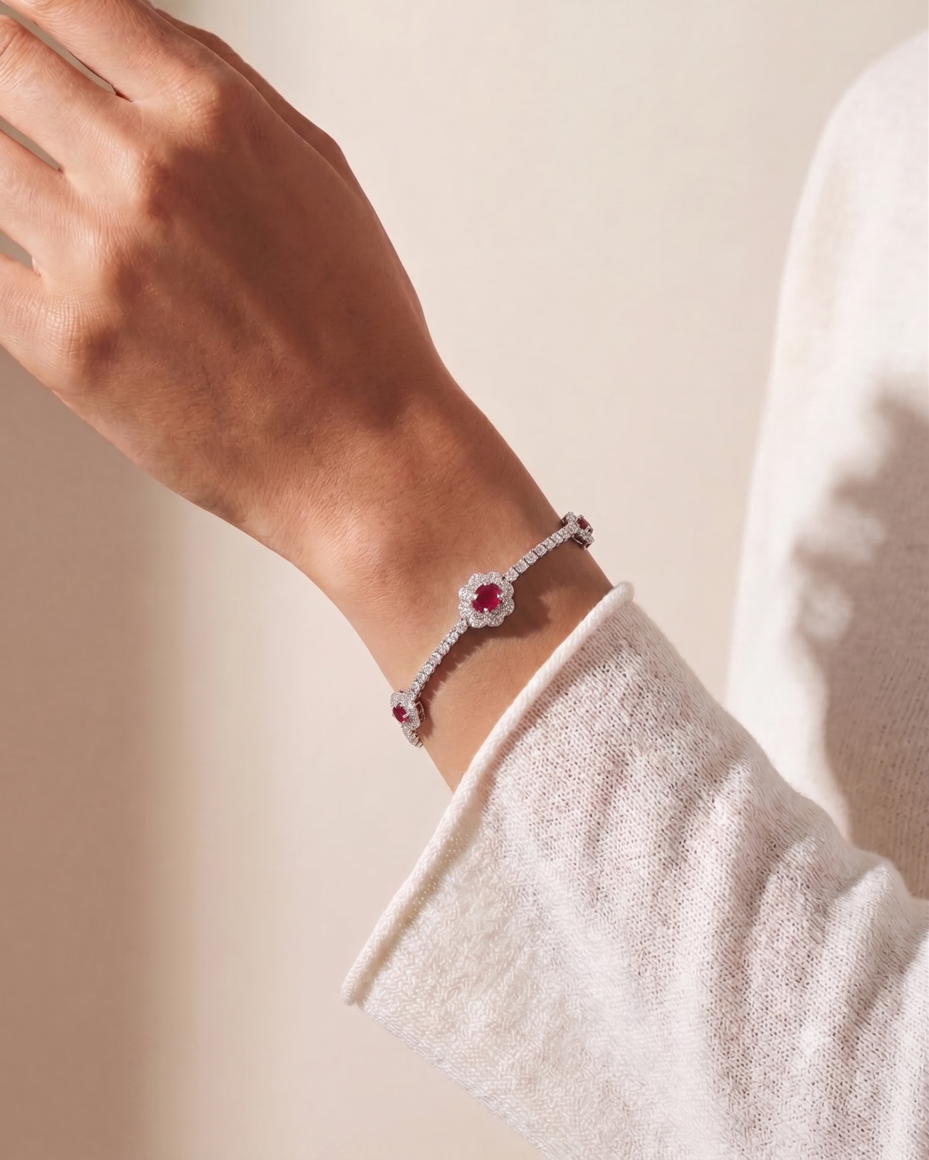 DIAMOND AND RUBY FLOWER TENNIS BRACELET