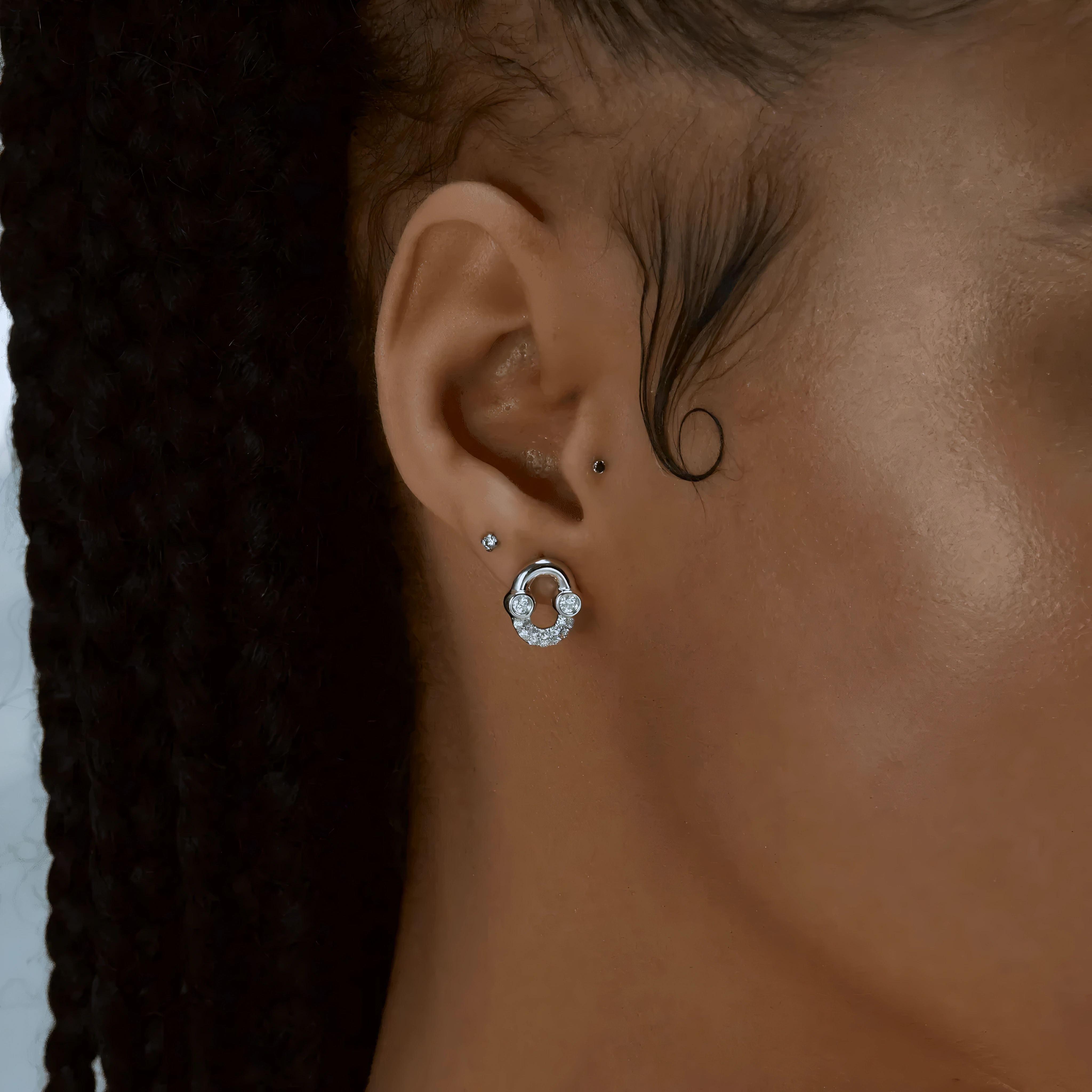 UMLAUT HALF DIAMOND STUD EARRINGS